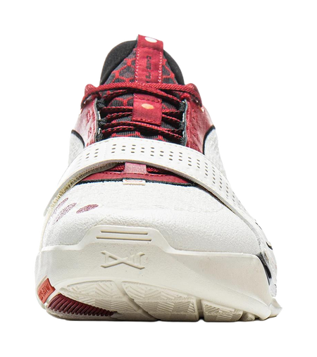 White basketball shoe with red mesh upper, red laces, and textured rubber sole