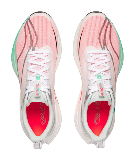 Pair of running shoes top view: white laces, pink upper panels, red interior lining, green side trim