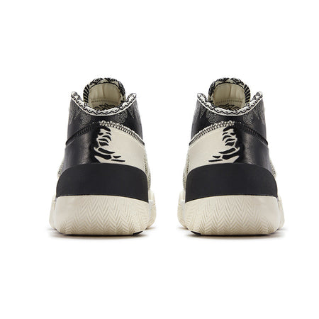 Men's basketball shoes, black high-top with white heel panel and lace-up collar