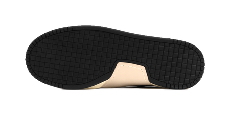 Black rubber outsole for skate shoes with curved grid tread pattern