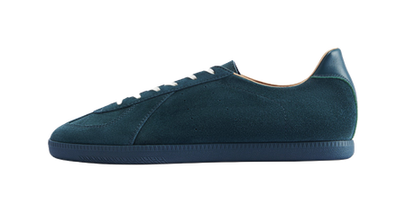 Pine mist green low-top training sneaker with textured upper and rubber sole