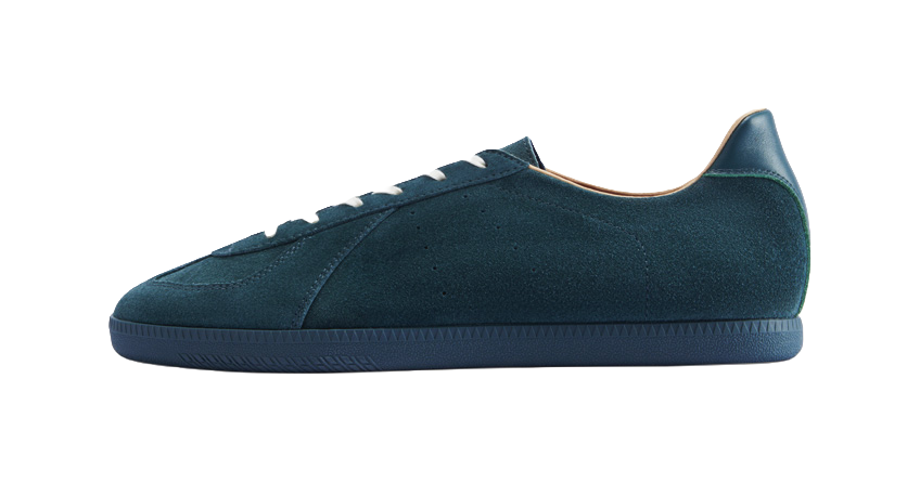 Pine mist green low-top training sneaker with textured upper and rubber sole