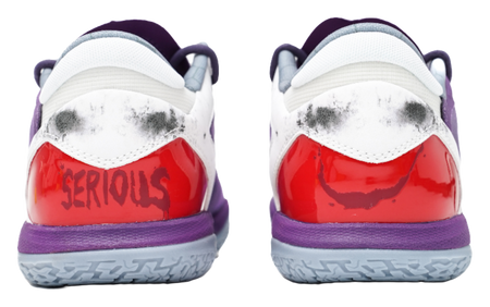 Purple basketball shoes with white heel collar and glossy red heel patch