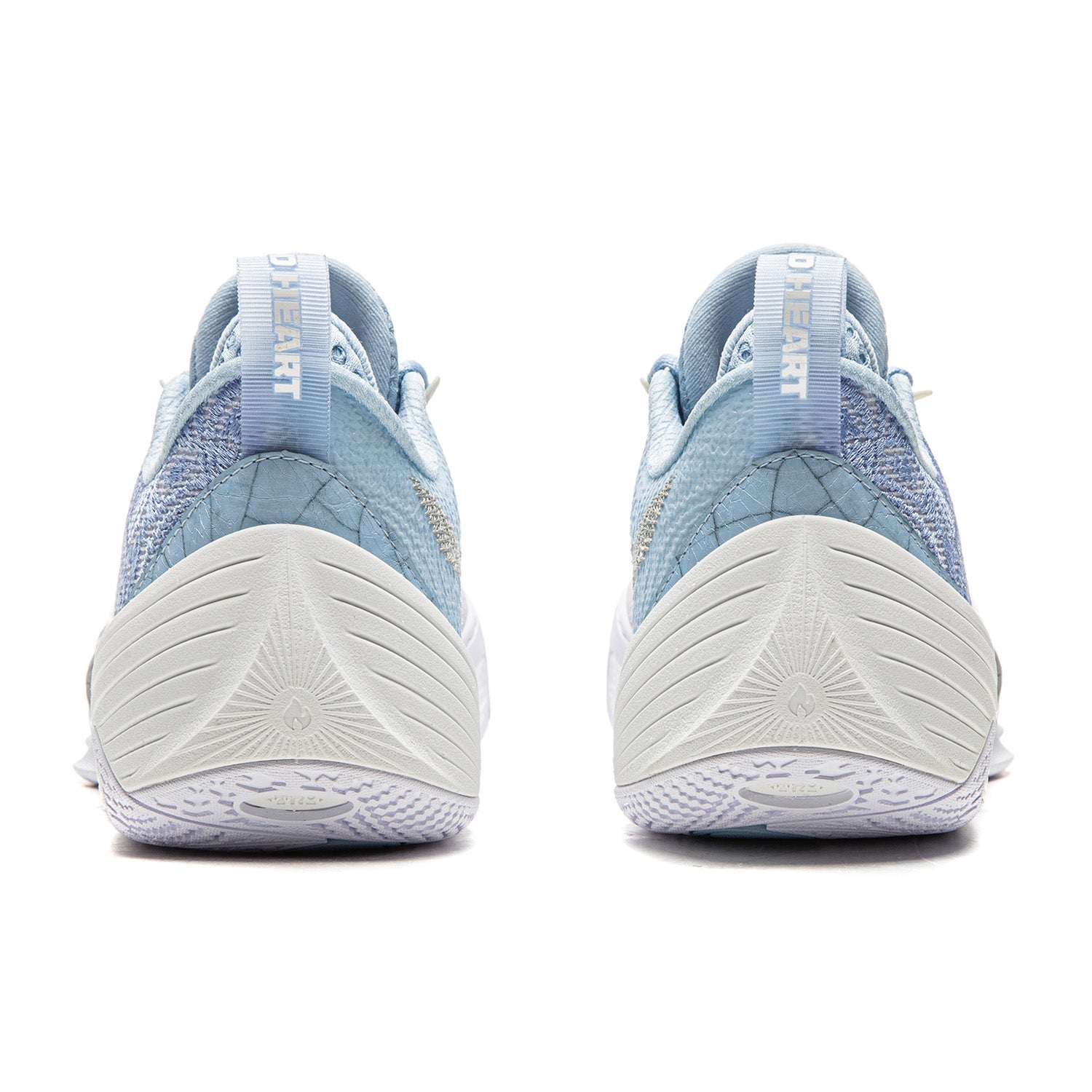 Men’s basketball shoe heels in light blue and white, with padded collar and grippy tread.
