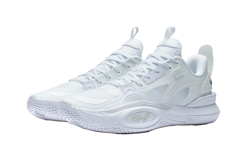 Pair of white basketball shoes, lace-up design and patterned overlays
