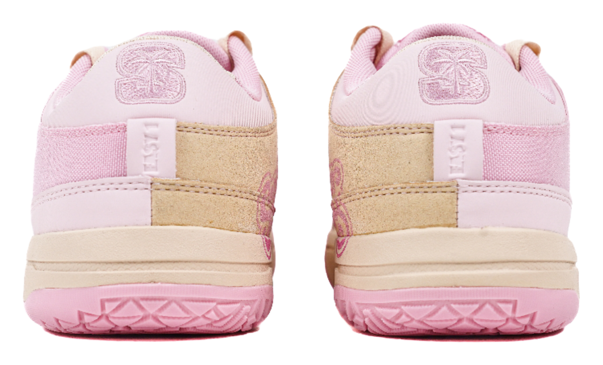 Back view of pink basketball sneakers with cushioned heel and beige panels
