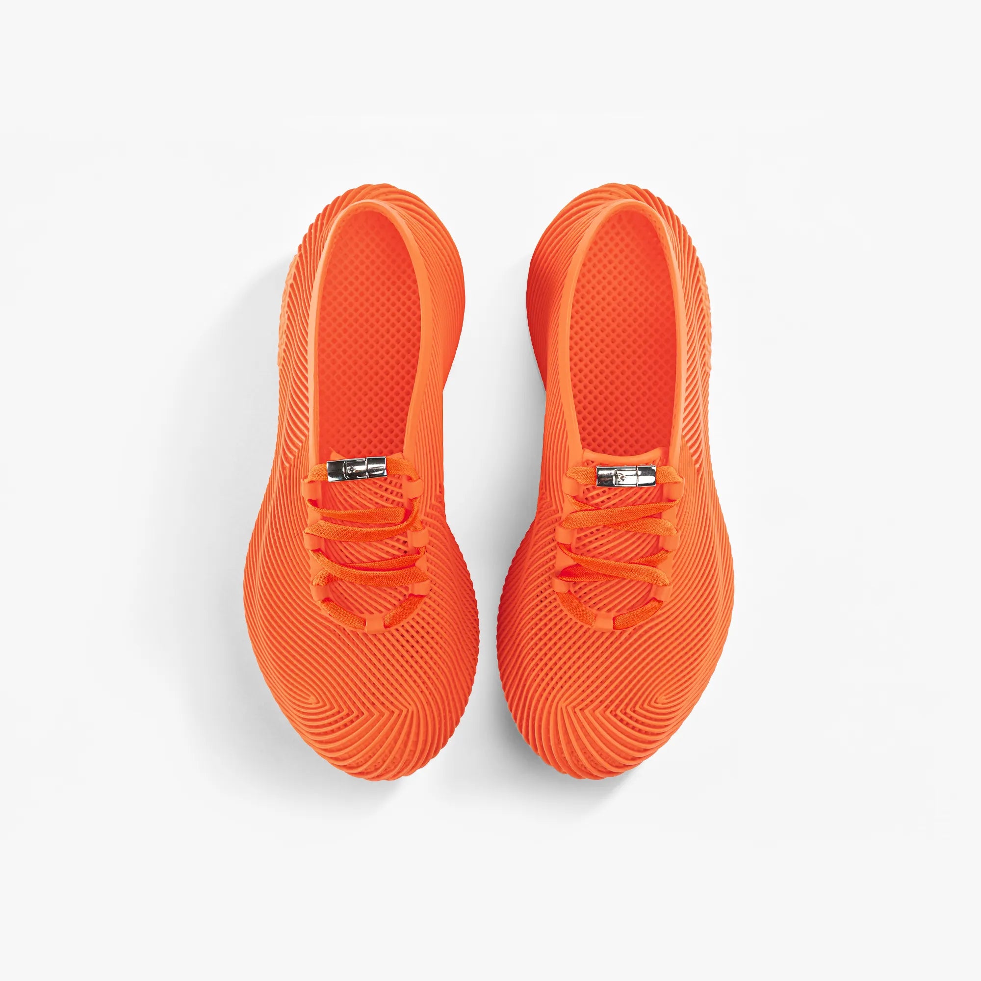 Orange 3D printed sneakers showing heel and lace-up strap detail