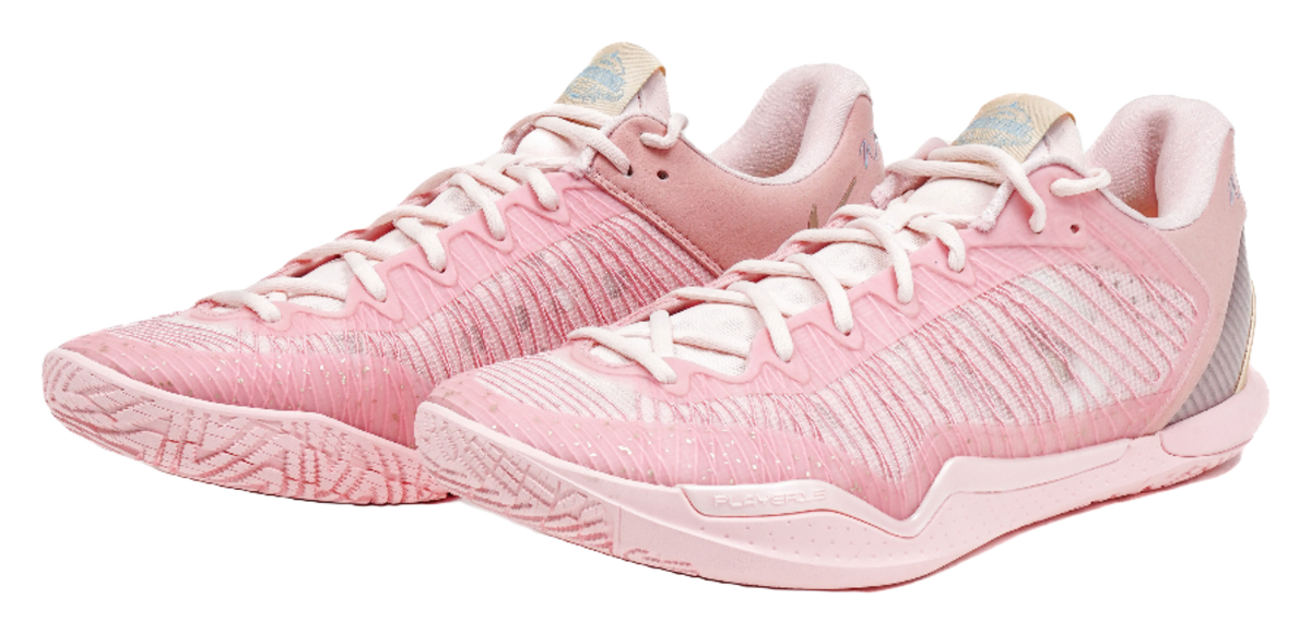 Pink lace-up basketball shoes with ribbed knit texture, padded collar, grippy outsole
