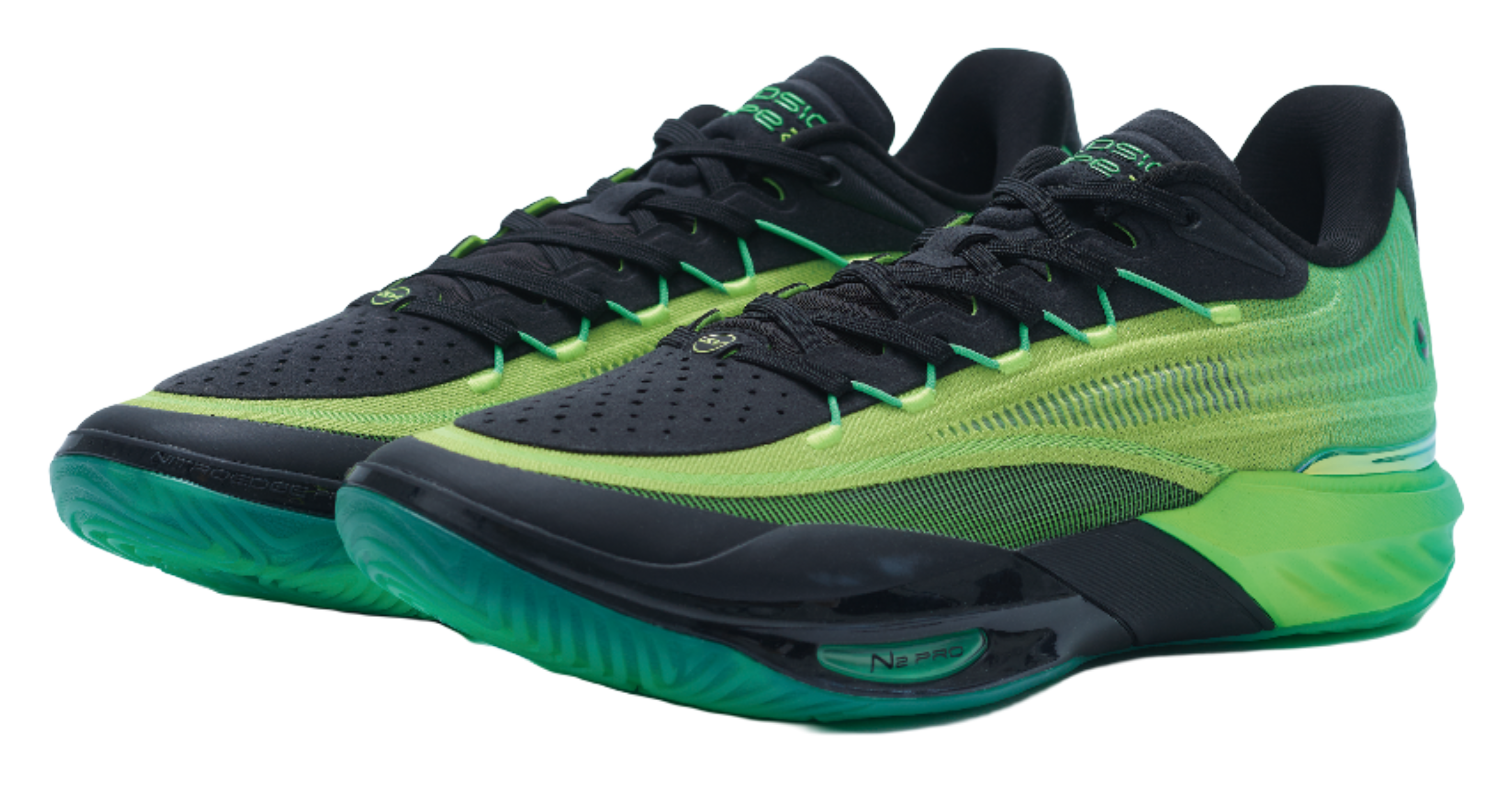 Green and black low-top basketball shoes with green laces and turquoise sole edge