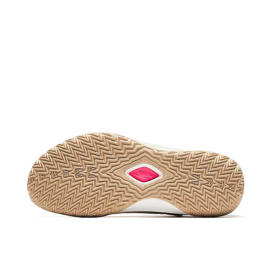 Basketball shoes outsole, tan traction tread with diamond logo and pink heel insert
