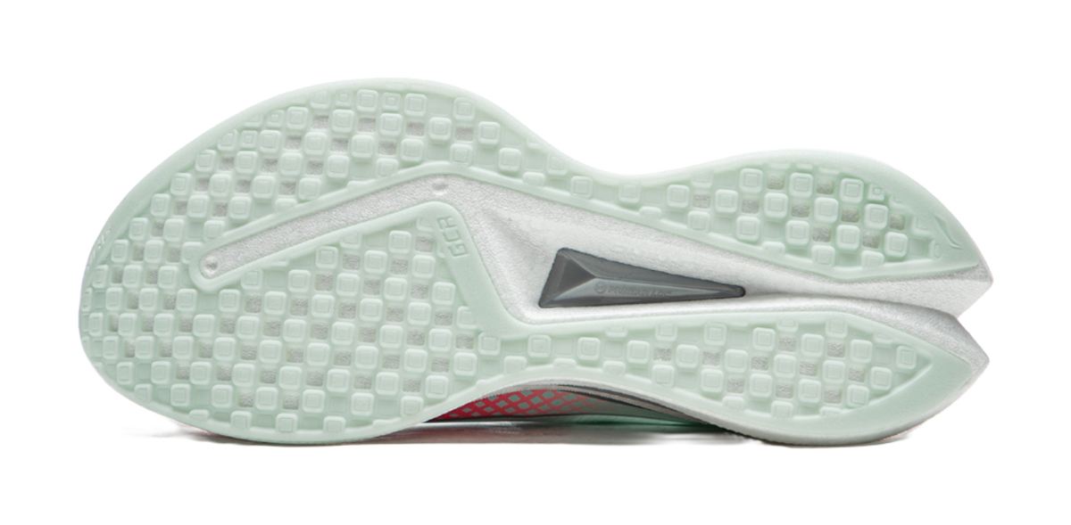 Mint running shoe outsole with textured tread and gray insert