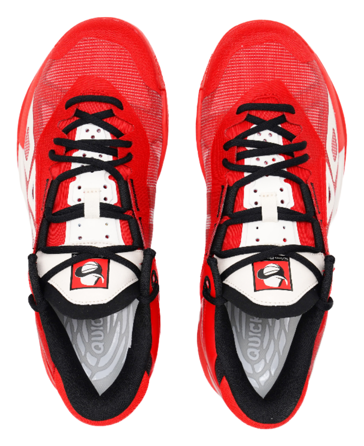 Pair of red basketball shoes, front view, with black laces and white toe panels