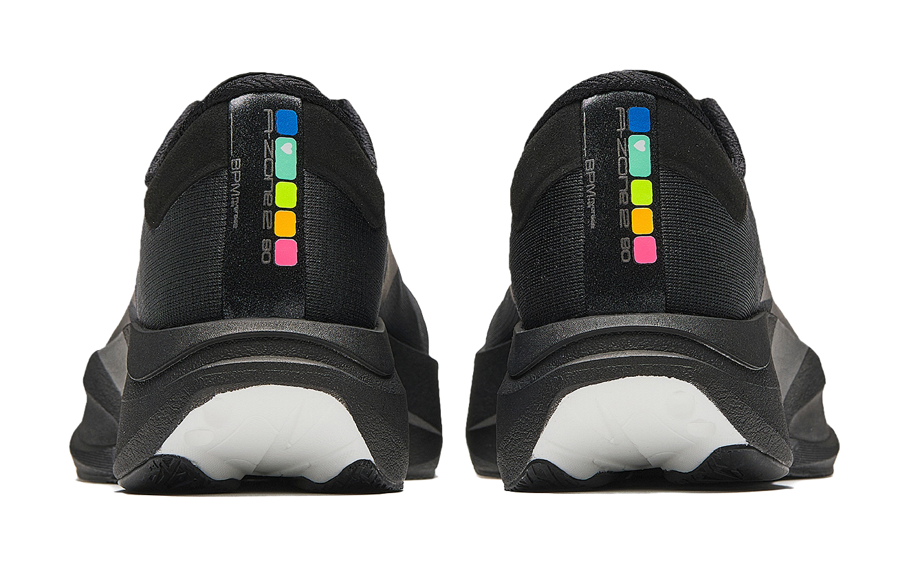 Men's low-top running shoes with black heel and multicolor logo accents on lining
