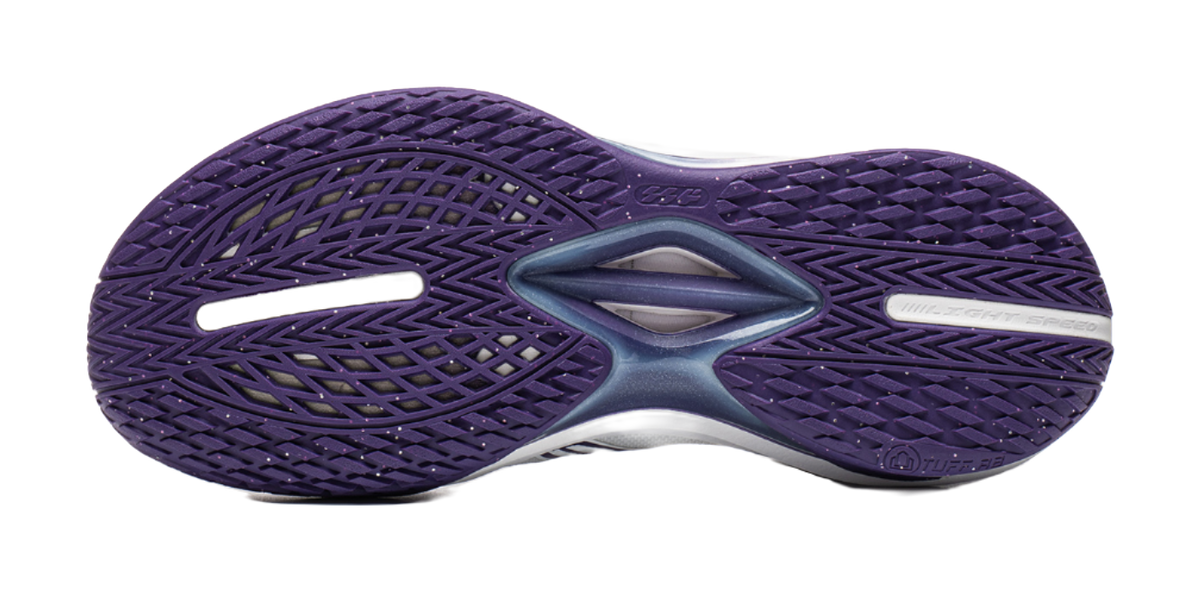 Basketball shoe outsole, purple tread pattern with molded midfoot logo.
