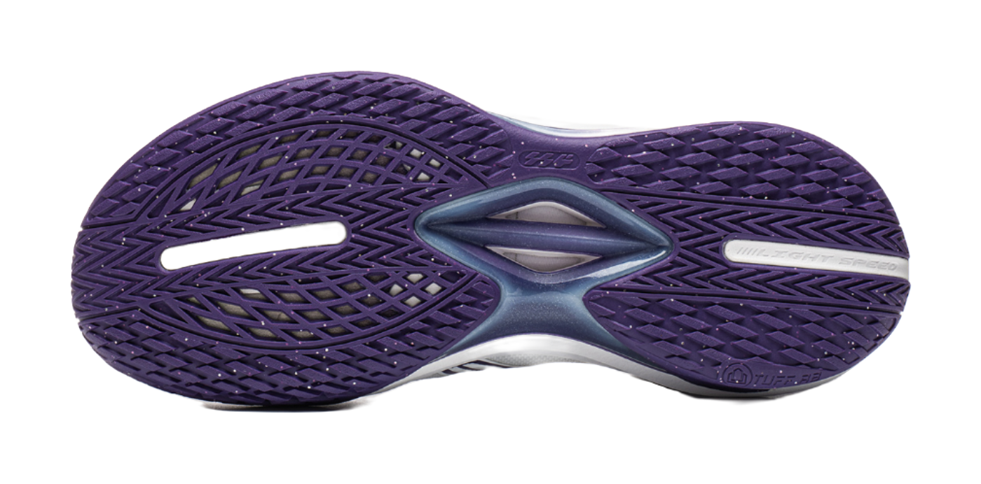 Basketball shoe outsole, purple tread pattern with molded midfoot logo.