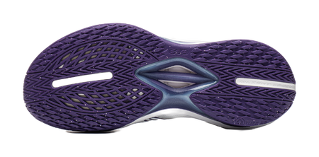Basketball shoe outsole, purple tread pattern with molded midfoot logo.