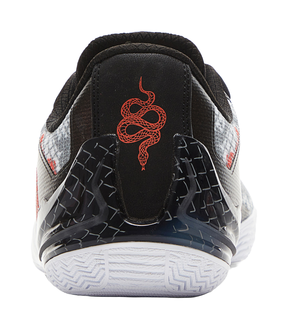 Basketball shoe heel with black back panel, red snake graphic, and speckled trim