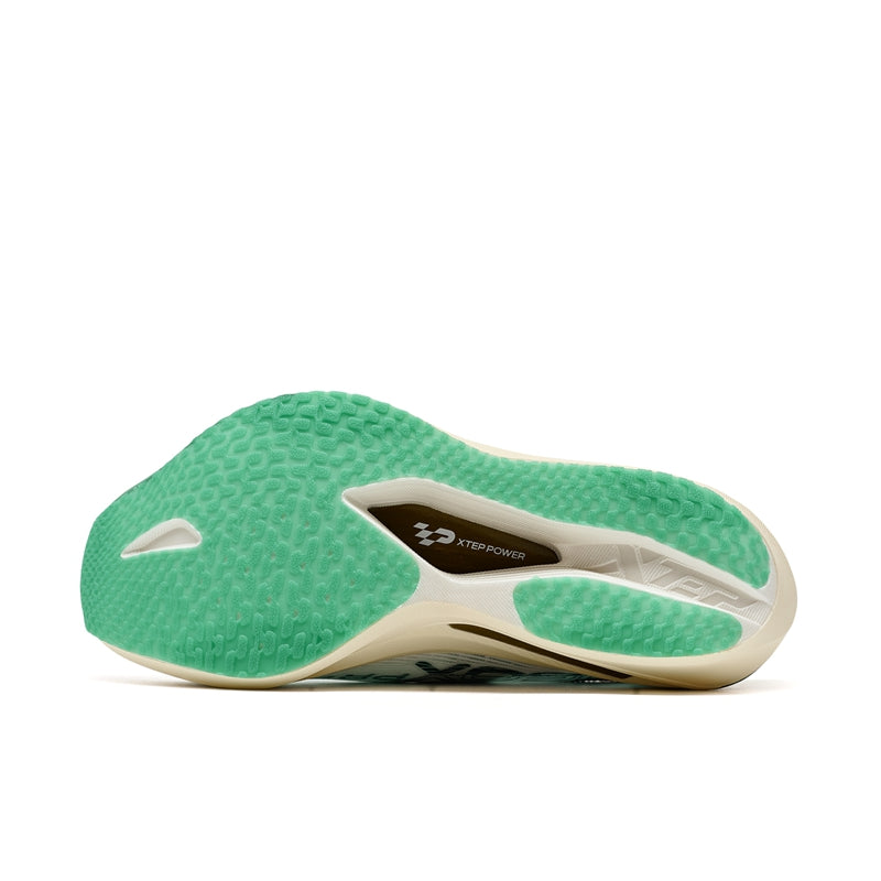 Men's running shoe outsole in green with tread and brand marking on footbed