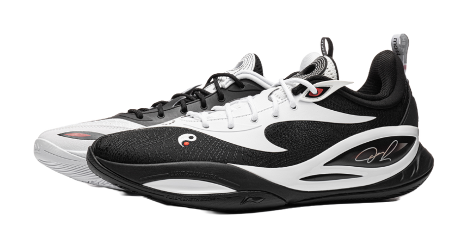 Black and white basketball shoe with white laces and black mesh upper