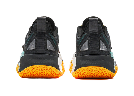 Pair of black basketball shoes with teal heel trim and orange textured outsole
