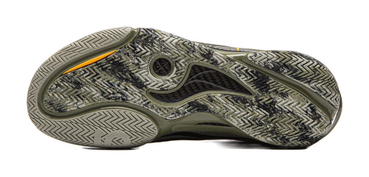 Basketball shoe outsole with textured pattern in olive-green and gray