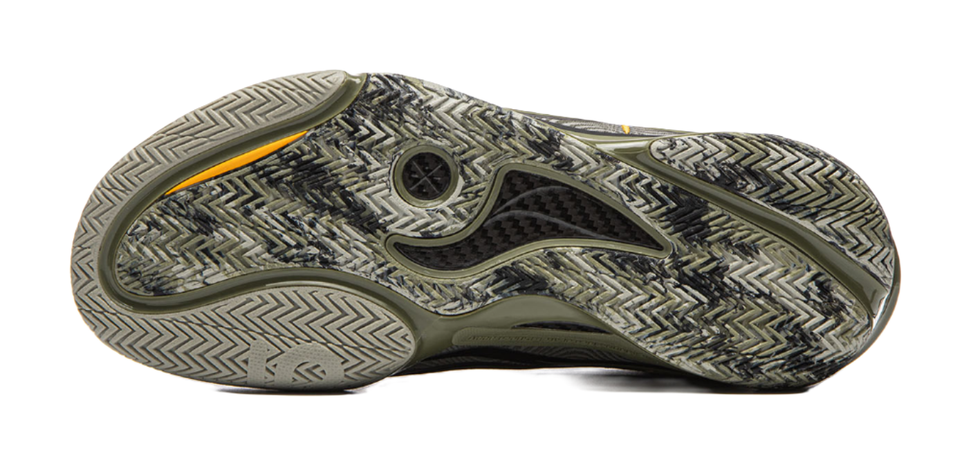 Basketball shoe outsole with textured pattern in olive-green and gray
