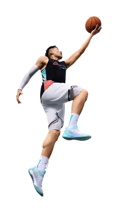 Basketball player wearing light blue and teal low-top shoes with white socks
