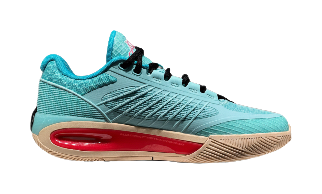 Turquoise low-top basketball shoe lateral side view with red outsole