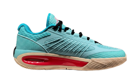 Turquoise low-top basketball shoe lateral side view with red outsole