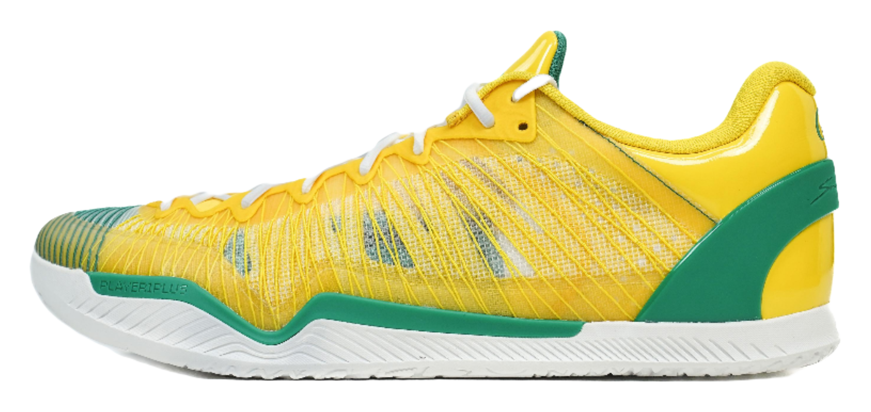 Yellow basketball shoe with green side panel, white laces, and textured sole