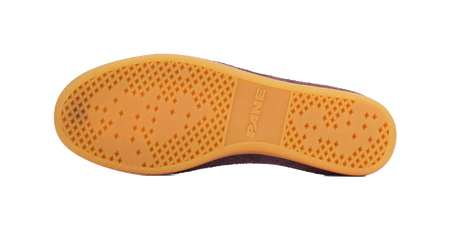 Training shoe outsole, orange gum rubber tread with PANE branding on heel area.
