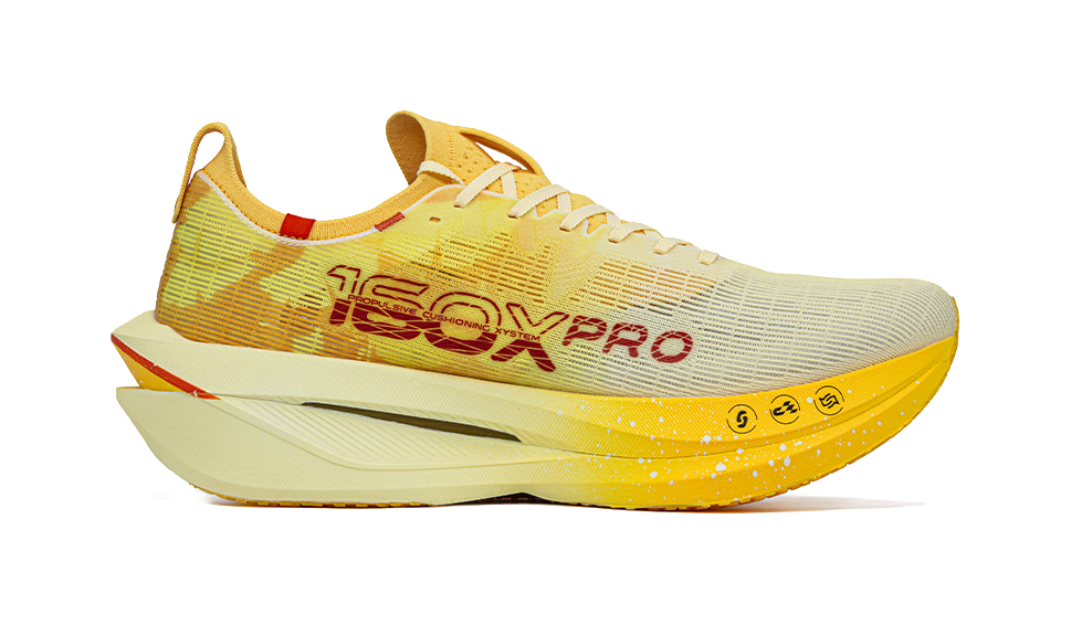 Men's racing shoe, yellow knit upper with red branding, white foam midsole.