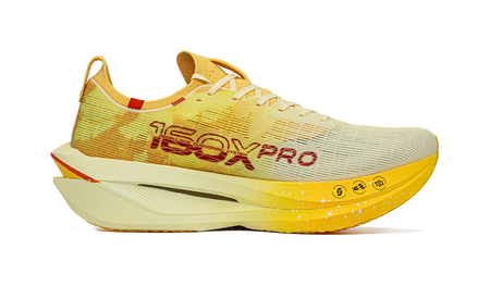 Men's racing shoe, yellow knit upper with red branding, white foam midsole.