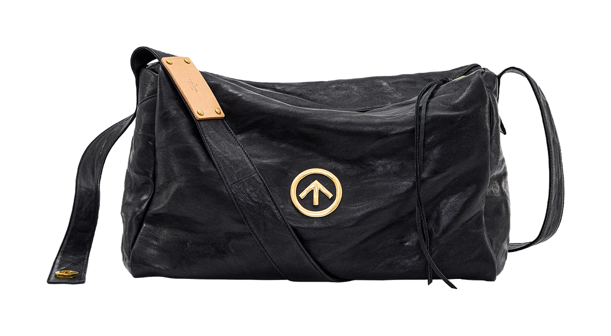 GROTTO black pleated sheepskin crossbody bag with tan label and gold logo badge