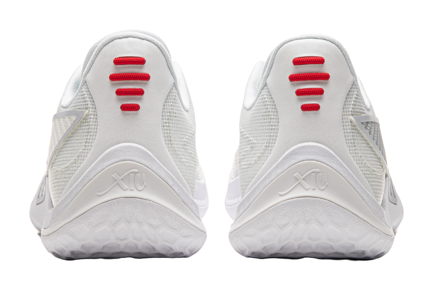 White mesh basketball shoes, rear view with red heel tabs and cushioned sole.