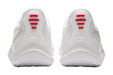 White mesh basketball shoes, rear view with red heel tabs and cushioned sole.