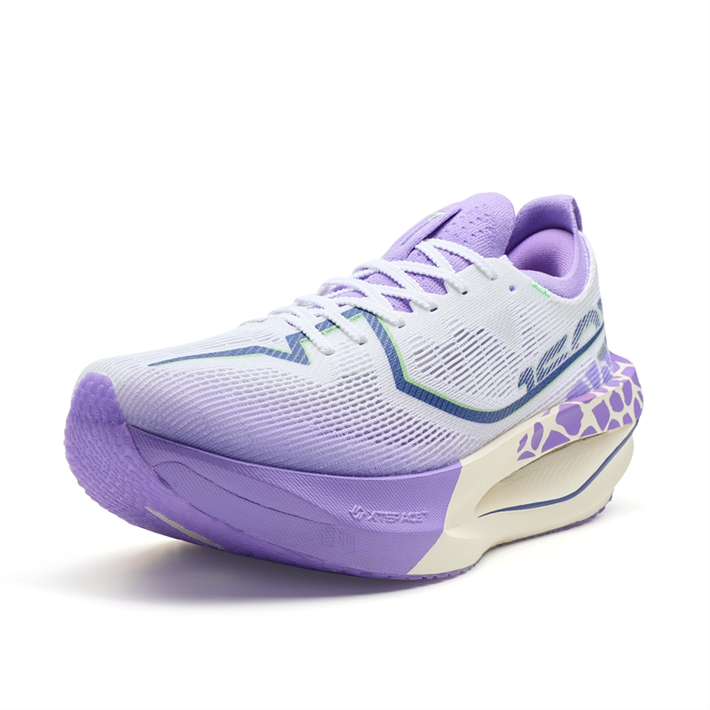 Women’s running shoe, white knit upper with green-blue chevron and purple heel