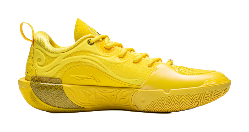 Radiant yellow lace-up basketball shoes with textured midsole and side panels