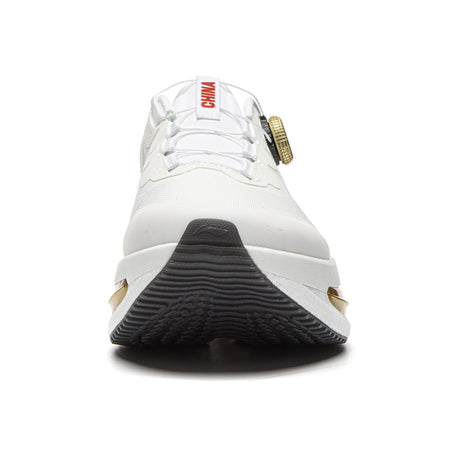 Men's white running shoes, black tread outsole, gold heel accents, “CHINA” tongue label
