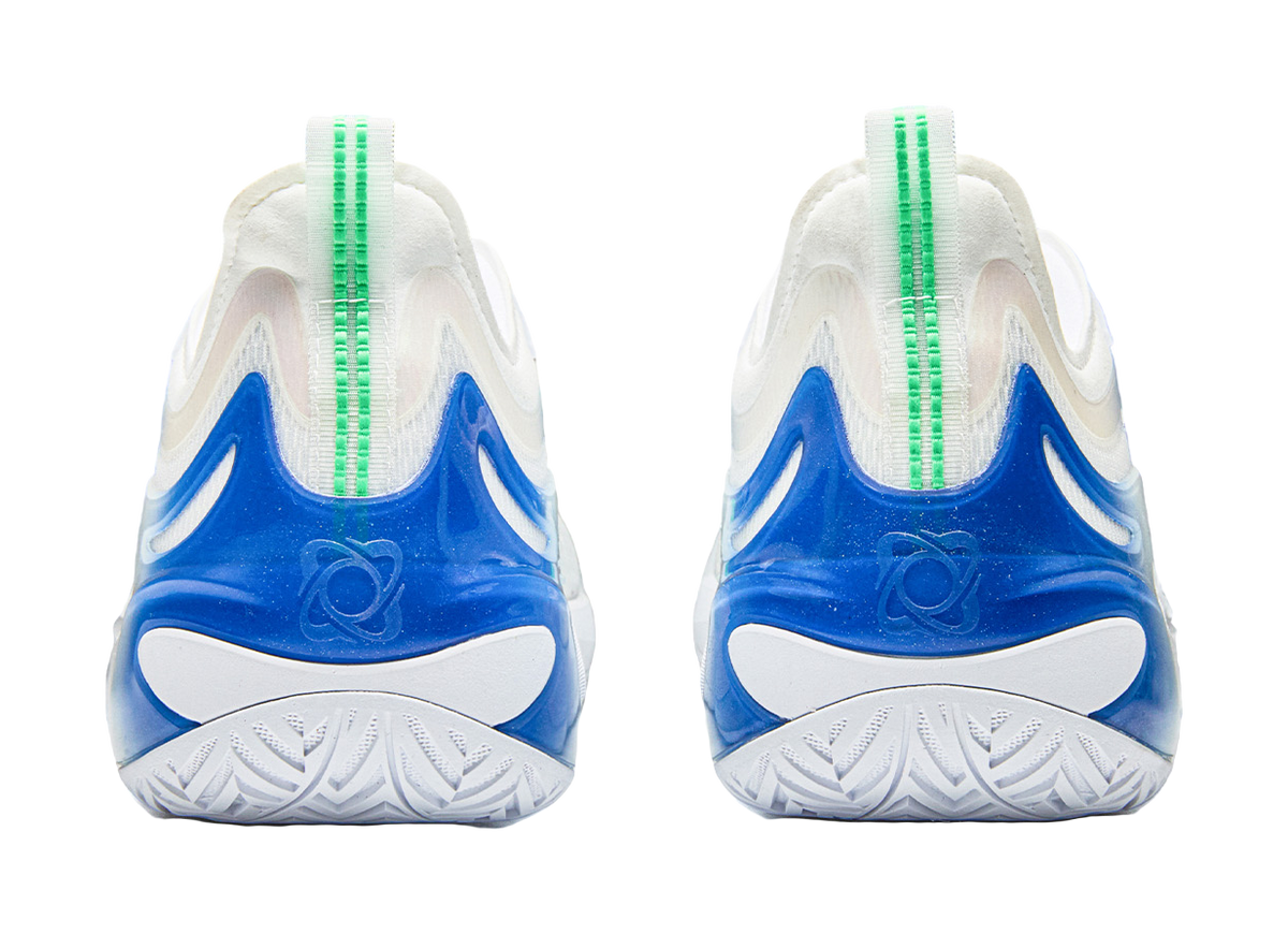 White and blue basketball shoes, rear view with green pull tabs and tread
