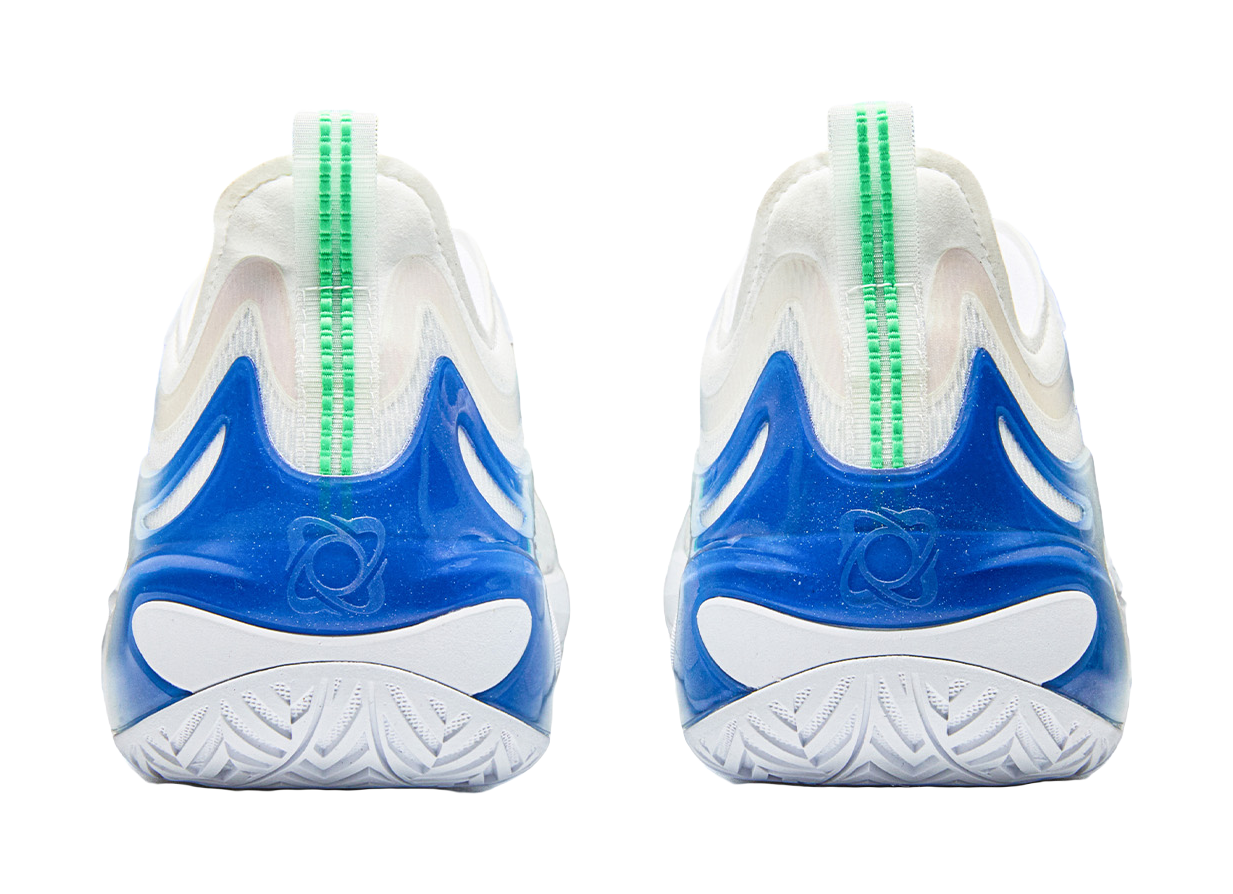 White and blue basketball shoes, rear view with green pull tabs and tread
