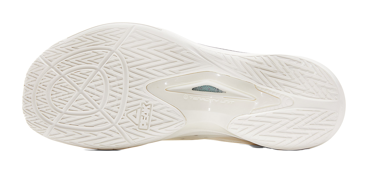 Lightweight basketball shoe outsole, off-white tread with patterned traction zones