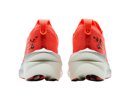 Pair of women’s marathon racing shoes, orange heels with light foam and treaded outsole.