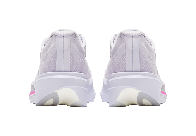 Back view of low running shoes with heel pull tabs and pink side stripe