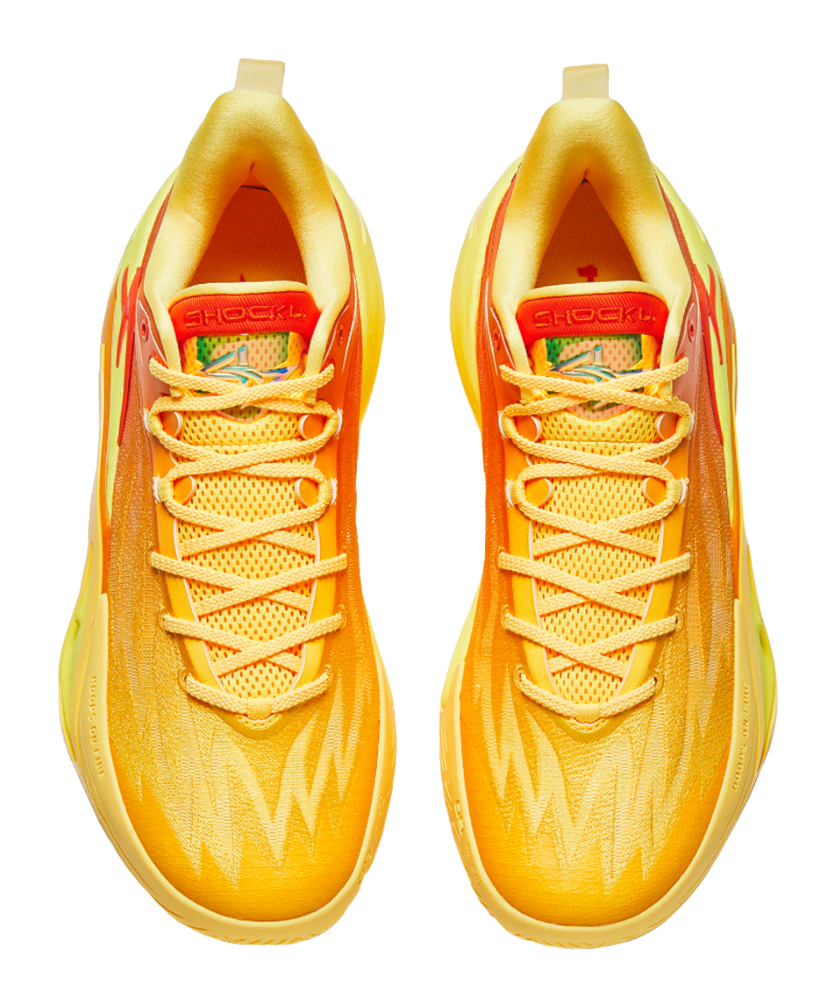 Pair of yellow and orange basketball shoes with mesh laces and padded tongue with logo.