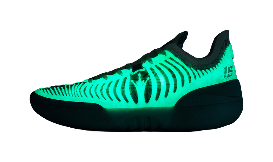 Dark basketball shoe with neon-green glow upper, ribbed knit and lace closure