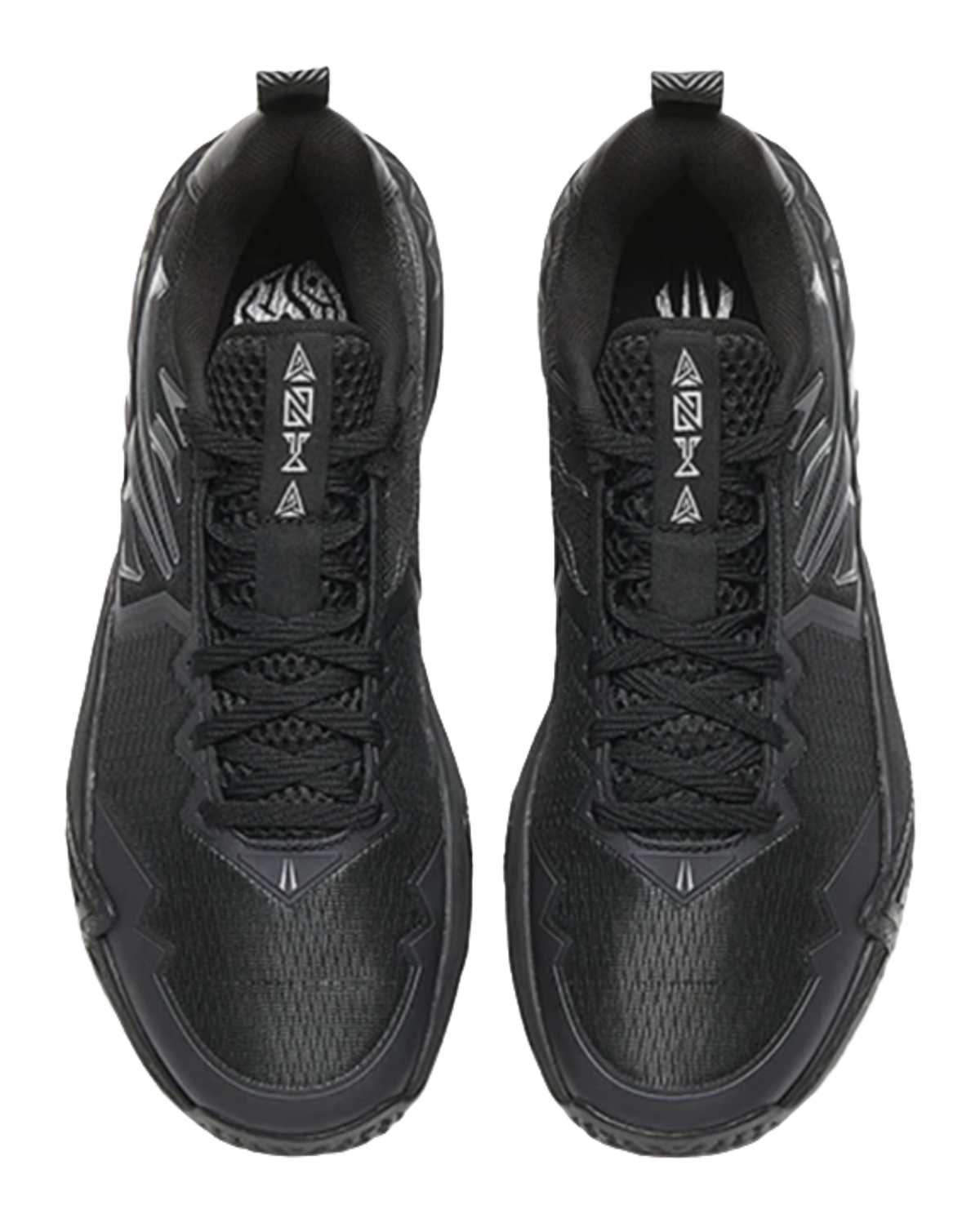 Black low-top basketball shoes, tongue and laces shown with logo patch
