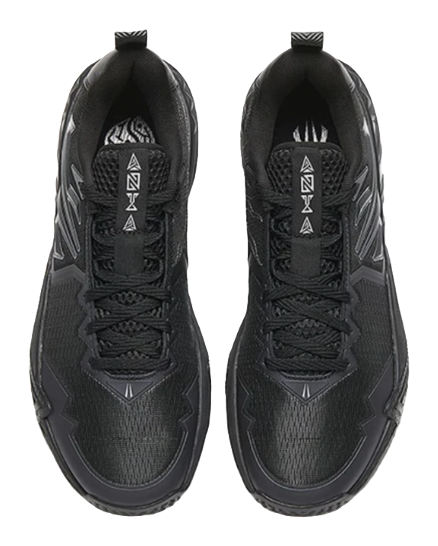 Black low-top basketball shoes, tongue and laces shown with logo patch