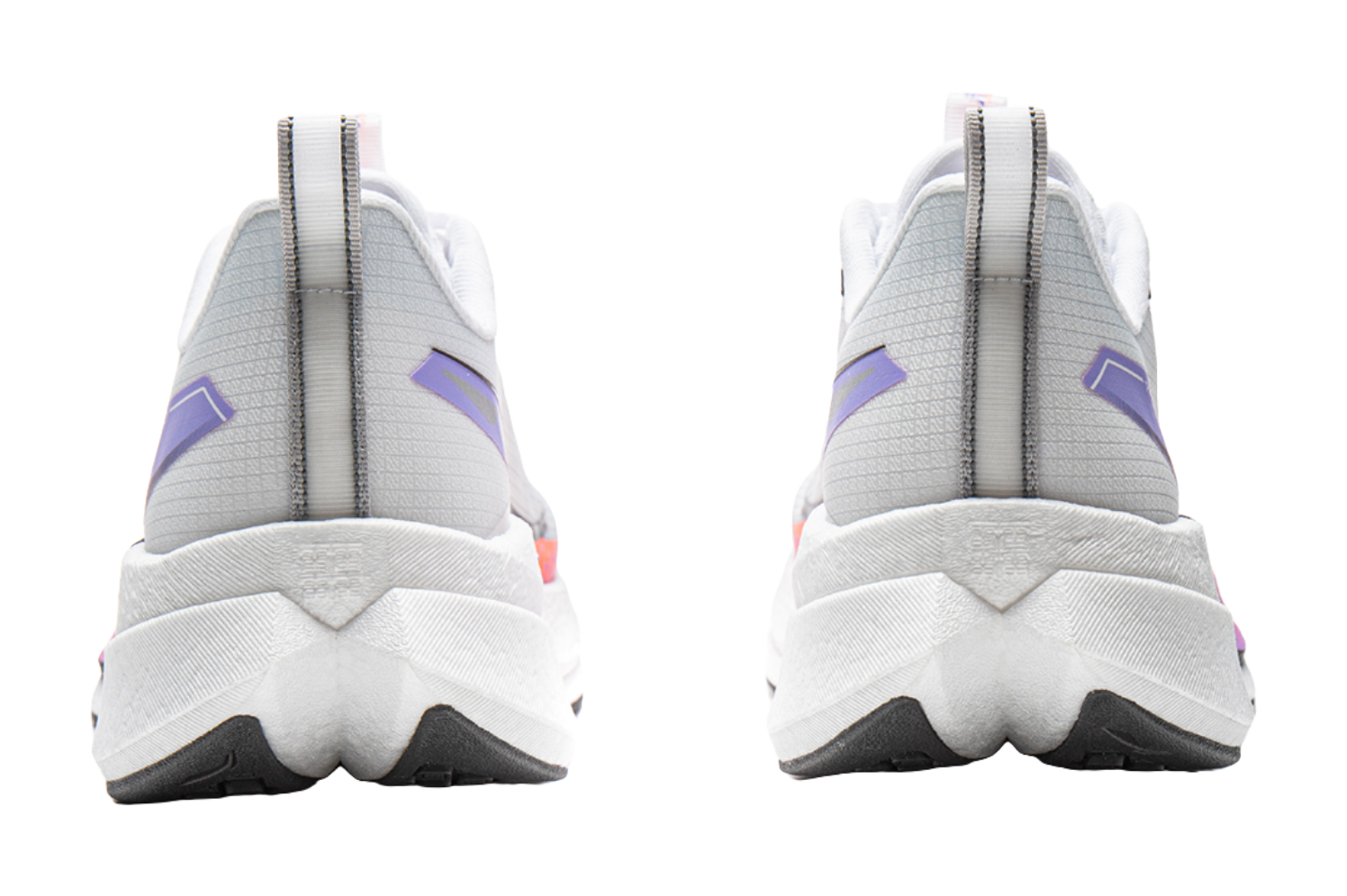 White running shoes back view with purple heel tabs and thick cushioned sole