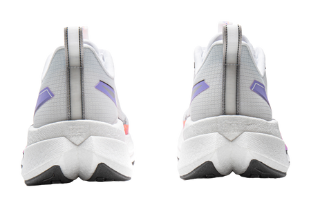 White running shoes back view with purple heel tabs and thick cushioned sole